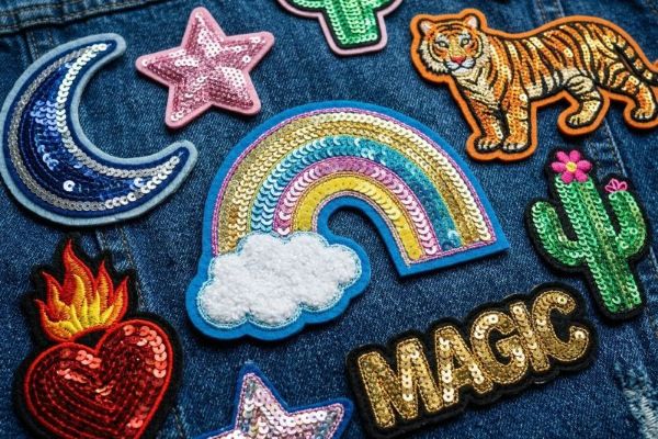Sparkling sequin patches on dance costume for entertainment industry